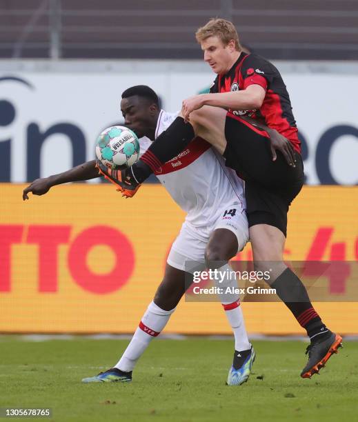 Silas Wamangituka of Stuttgart is challenged by Martin Hinteregger of Frankfurt during the Bundesliga match between Eintracht Frankfurt and VfB...