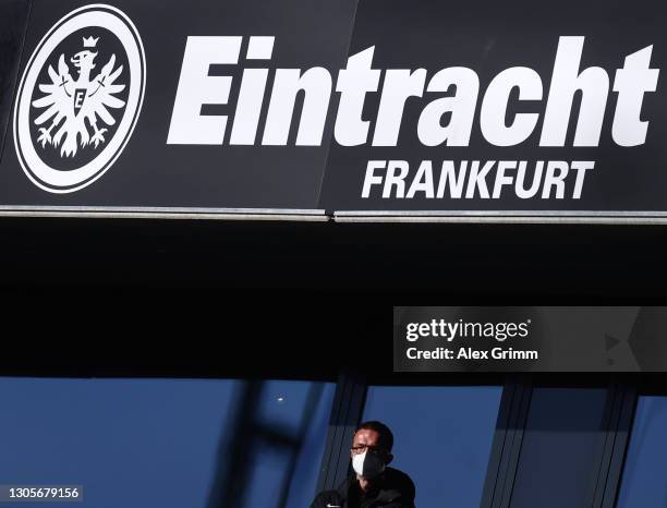 Fredi Bobic of Frankfurt looks on from the tribune during the Bundesliga match between Eintracht Frankfurt and VfB Stuttgart at Deutsche Bank Park on...