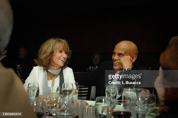 American actor, singer, and activist Harry Belafonte and his wife Pamela Frank watch performance during Harry Belafonte's birthday party on March, 3...