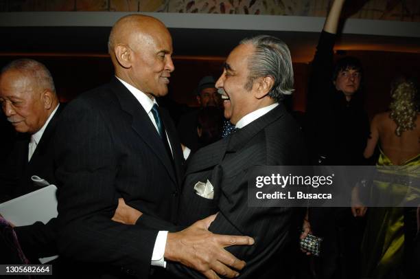 American actor, singer, and activist Harry Belafonte speaks with New York Politician Charles Rangel during Harry Belafonte's birthday party on March,...