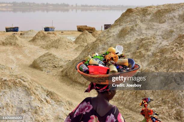 dakar kitsch vendor at  lake retba aka lac rose - senegal landscape stock pictures, royalty-free photos & images