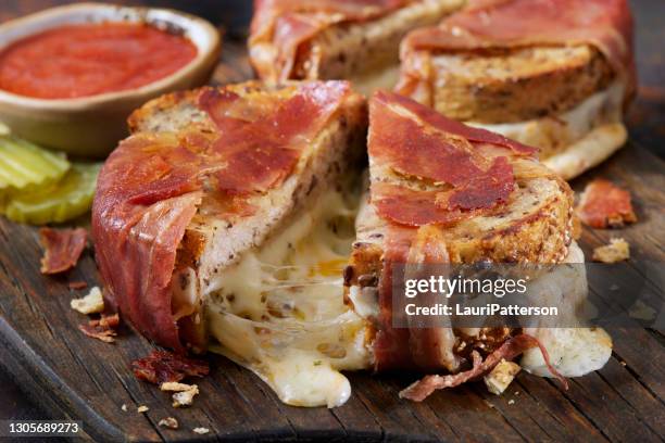 prosciutto wrapped grilled cheese sandwich's - prosciutto wrapped stock pictures, royalty-free photos & images