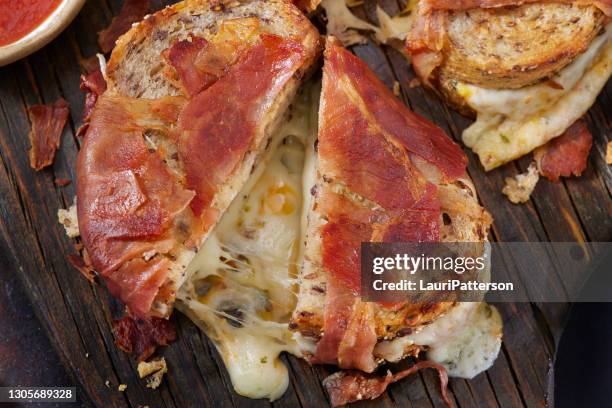 prosciutto wrapped grilled cheese sandwich's - prosciutto wrapped stock pictures, royalty-free photos & images