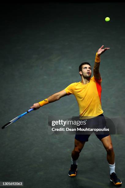 Borna Coric of Croatia serves in his match against Marton Fucsovics of Hungary during Day 6 of the 48th ABN AMRO World Tennis Tournament at Ahoy on...