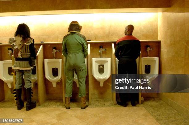 Trekkies seek relief relief in the urinal in Las Vegas at the 40th Annual official Star Trek Convention , John Stephan, dressed as a Klingon who is a...