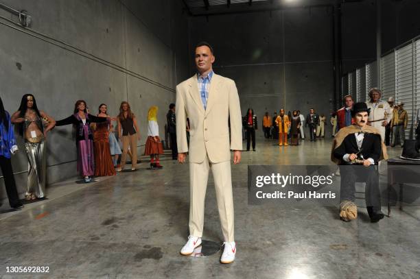 Tom Hanks stands lonely in the warehouse as Charlie Chaplin sits , The Hollywood Wax Museum auctioned all these figures May 4th 2009 one fetching...