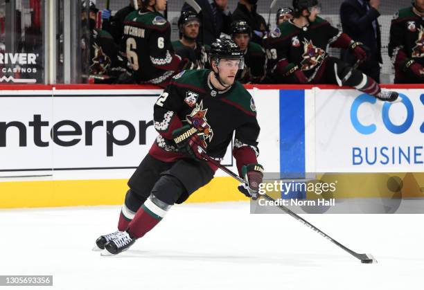 Johan Larsson of the Arizona Coyotes skates with the puck against the Minnesota Wild at Gila River Arena on March 05, 2021 in Glendale, Arizona.