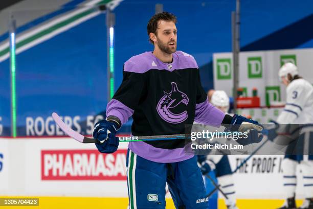 Brandon Sutter of the Vancouver Canucks wears a Hockey Fight Cancer jersey during the pre-game warm up print to NHL hockey action against the Toronto...