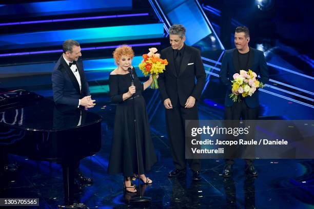 Amadeus, Ornella Vanoni, Fiorello and Francesco Gabbani are seen on stage during at the 71th Sanremo Music Festival 2021 at Teatro Ariston on March...