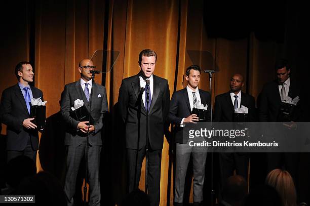 Eric Greitens, Tim King, Willie Geist, Laren Poole, Deogratias Niyizonkiza and Jake Wood pose onstage at GQ's Gentlemen's Ball Presented By Gentleman...