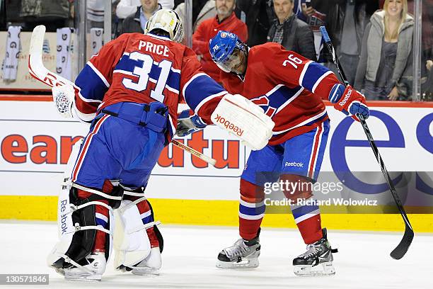 Carey Price and P.K. Subban of the Montreal Canadiens do their "triple low-five" celebration after defeating the Philadelphia Flyers 5-1 and Price's...