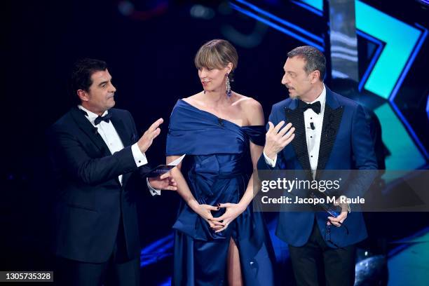 Alberto Tomba, Federica Pellegrini and Amadeus are seen on stage during at the 71th Sanremo Music Festival 2021 at Teatro Ariston on March 06, 2021...