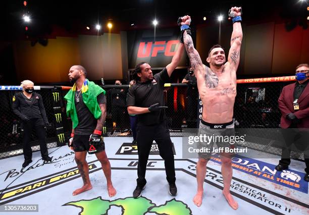 Aleksandar Rakic of Austria reacts after his decision victory over Thiago Santos of Brazil in their light heavyweight fight during the UFC 259 event...