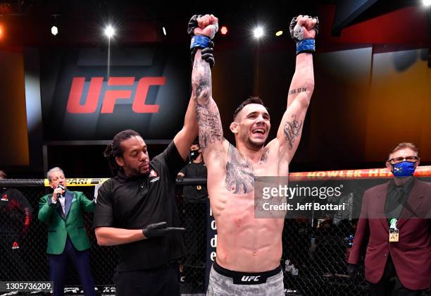 Aleksandar Rakic of Austria reacts after his decision victory over Thiago Santos of Brazil in their light heavyweight fight during the UFC 259 event...