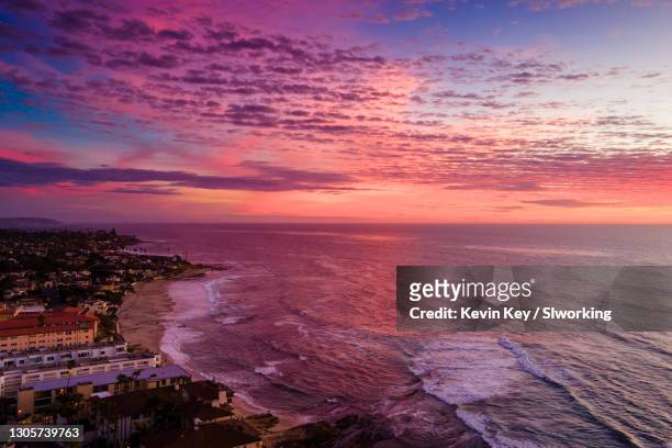 amazing colorful periwinkle sunset in la jolla, california - la jolla stock-fotos und bilder