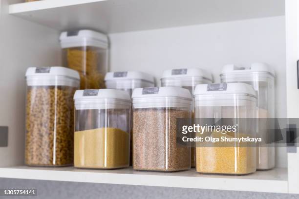 food storage containers in the kitchen - speisekammer stock-fotos und bilder