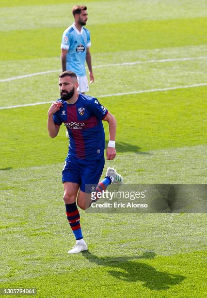 Dimitris Siovas of SD Huesca celebrates after scoring their side's first goal during the La Liga Santander match between SD Huesca and RC Celta at...