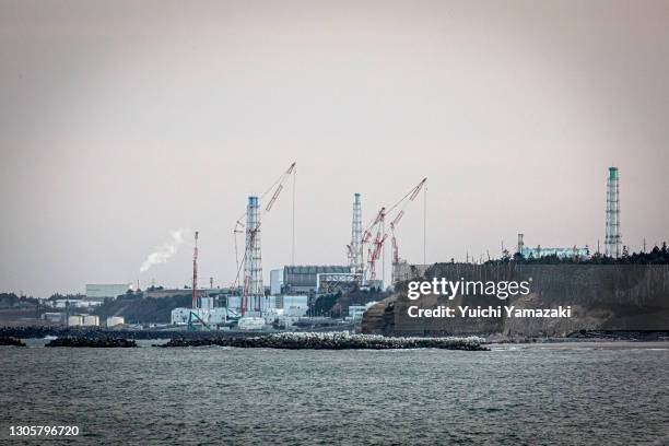 The crippled Fukushima Daiichi Nuclear Power Plant is seen on March 7, 2021 in Namie, Japan. In ceremonies that are expected to be scaled back...