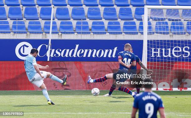 Nolito of Celta Vigo scores their side's second goal during the La Liga Santander match between SD Huesca and RC Celta at Estadio El Alcoraz on March...