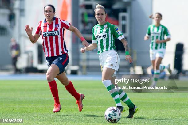 Silvia Meseguer of Atletico de Madrid and Angela Sosa of Real Betis in action during the Spanish women's league, Primera Iberdrola, football match...