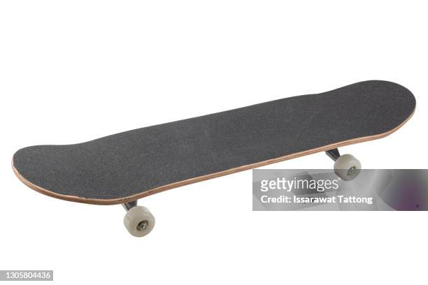black skateboard isolated on white background - skate imagens e fotografias de stock