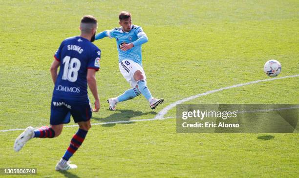 Fran Beltran of Celta Vigo scores their sides fourth goal during the La Liga Santander match between SD Huesca and RC Celta at Estadio El Alcoraz on...