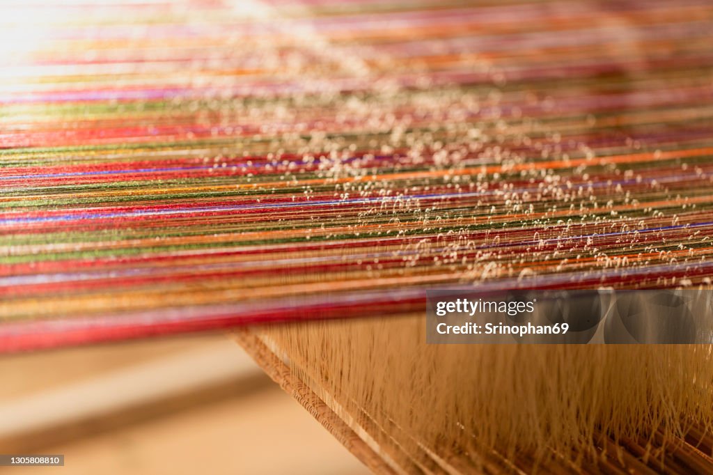 Traditional silk weaving Can be seen in the countryside of Thailand.
