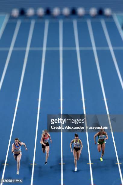 Athletes compete in the first round of Women's 60 metres during the first session on Day 3 of the European Athletics Indoor Championships at Arena...