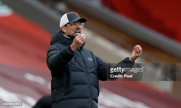 Jurgen Klopp, Manager of Liverpool reacts during the Premier League match between Liverpool and Fulham at Anfield on March 07, 2021 in Liverpool,...