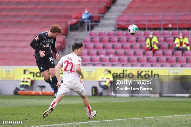 Joshua Sargent of SV Werder Bremen scores their sides first goal during the Bundesliga match between 1. FC Koeln and SV Werder Bremen at...