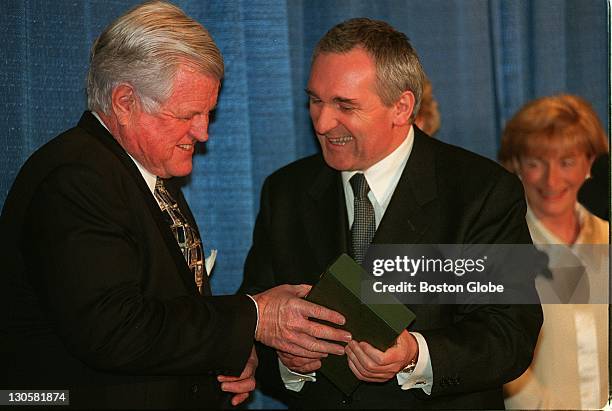 Prime Minister of Ireland Bertie Ahern, right, exchanging gifts with Sen. Edward M. Kennedy at the John F. Kennedy Library in Boston, Mass.