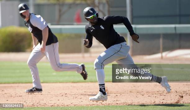 Luis Robert of the Chicago White Sox participates in base running drills during a workout on March 3, 2021 at Camelback Ranch in Glendale Arizona.