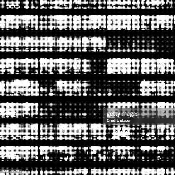 workers working late. office windows by night. - stockholm city stock illustrations
