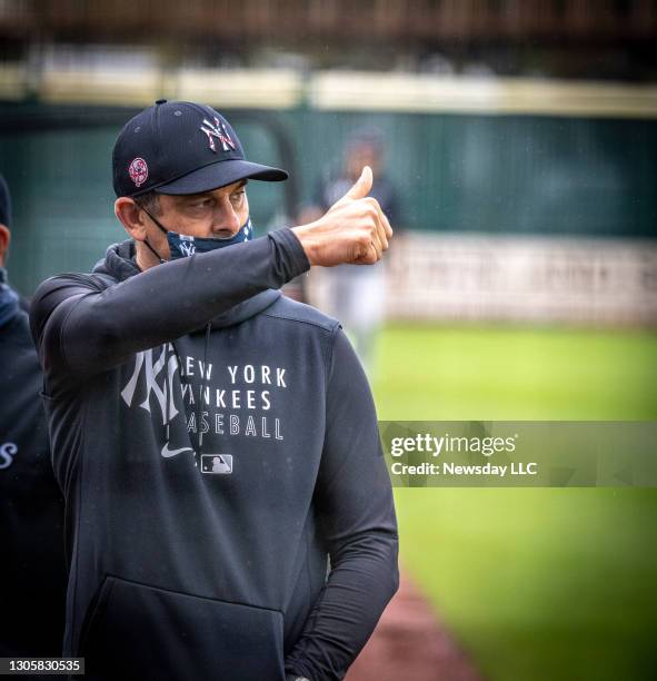 New York Yankees' manager Aaron Boone gives a thumbs up on field for his first game since getting a pacemaker at LECOM Park in Bradenton, Florida on...