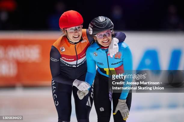 Hanne Desmet of Belgium and Suzanne Schulting of Netherlands celebrate in the Ladies 1000m final during day 3 of the ISU World Short Track Speed...