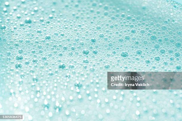 soap bubbles from foam bath. - douche savon photos et images de collection