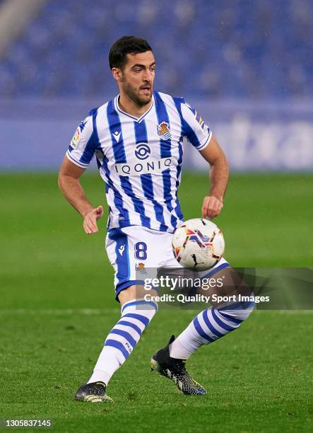 Mikel Merino of Real Sociedad in action during the La Liga Santander match between Real Sociedad and Levante UD at Reale Arena on March 07, 2021 in...