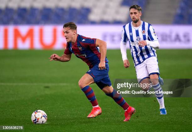 Dani Gomez of Levante UD runs with the ball during the La Liga Santander match between Real Sociedad and Levante UD at Reale Arena on March 07, 2021...