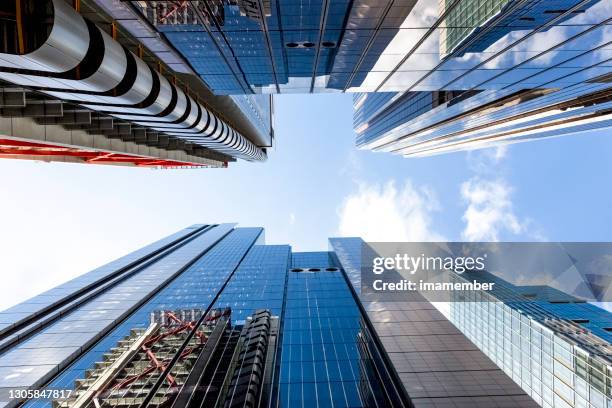 low angle view of modern office buildings, skyscrapers, sky background with copy space - skyscraper abstract stock pictures, royalty-free photos & images