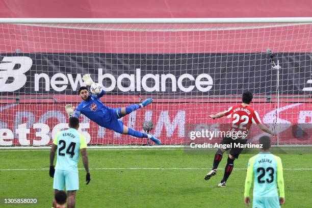 Rui SIlva of Granada CF saves a penalty kick from Raul Garcia of Athletic Club during the La Liga Santander match between Athletic Club and Granada...