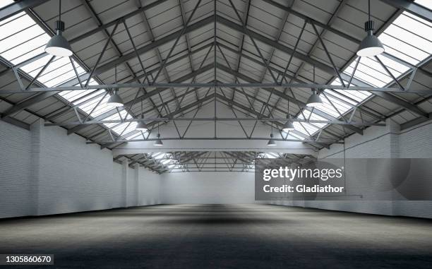 front view of an empty large warehouse interior - painted roof stock pictures, royalty-free photos & images