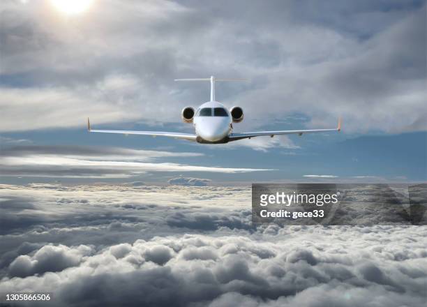 private plane flying - jets stock pictures, royalty-free photos & images