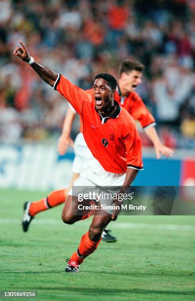 Patrick Kluivert of Holland celebrates after scoring during the World Cup Semi Final between Brazil and Holland at the Orange Velodrome on July 07,...