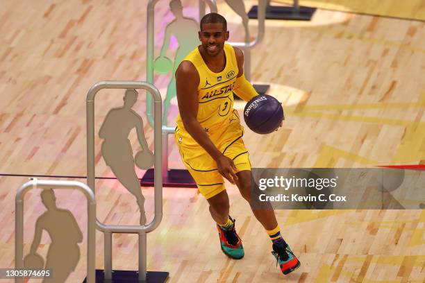 Chris Paul of the Phoenix Suns competes in the 2021 NBA All-Star - Taco Bell Skills Challenge during All-Star Sunday Night at State Farm Arena on...