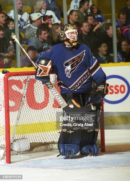 Olaf Kolzig of the Washington Capitals skates against the Toronto Maple Leafs during NHL game action on January 2, 1999 at Maple Leaf Gardens in...