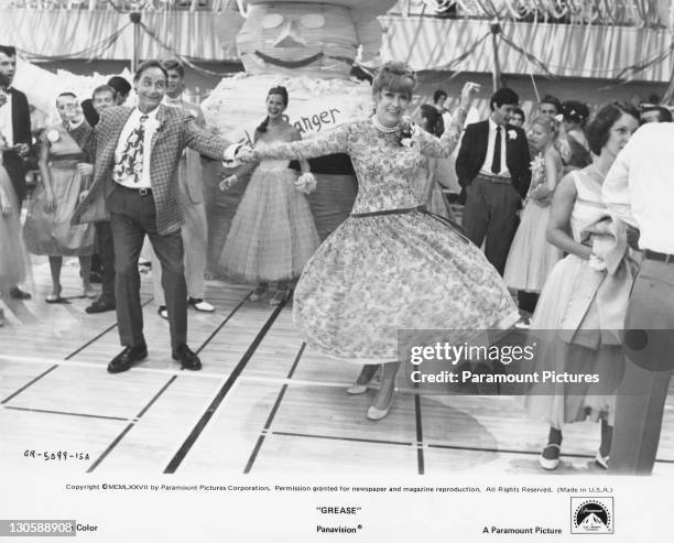 Eve Arden as Principal McGee and Sid Caesar as Coach Calhoun in a scene from the Paramount musical 'Grease', 1978.