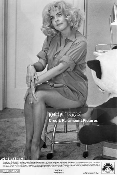 American actress Stockard Channing as Rizzo, wearing a blonde wig at a slumber party in a scene from the Paramount musical 'Grease', 1978.