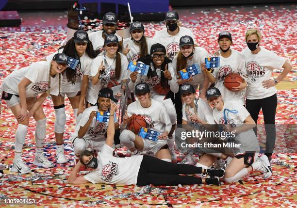 Head coach Tara VanDerveer of the Stanford Cardinal and her team celebrate on the court after their 75-55 victory over the UCLA Bruins to win the...