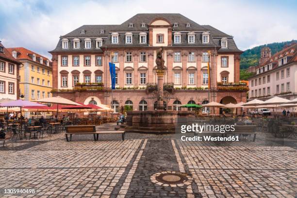 germany, baden-wurttemberg, heidelberg, old town market square with town hall in background - heidelberg stock pictures, royalty-free photos & images