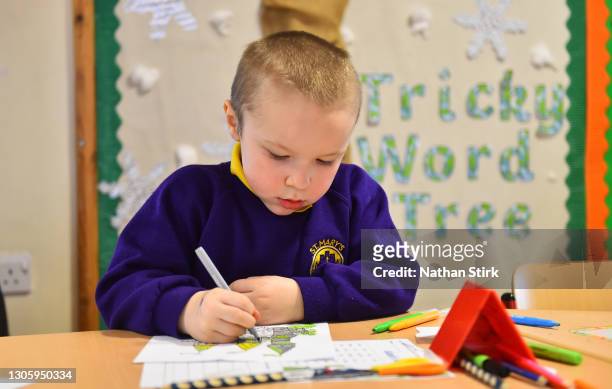 Child attends a lesson at St Mary’s CE Primary School on March 08, 2021 in Stoke on Trent, England. Schools in England welcome pupils back after...